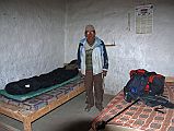 Mustang Lo Manthang 01 02-1 My Room We had trouble finding a place to stay in Lo Manthang, but a man invited us to stay at his house � for a fee of course. Here he is with my basic but ok room.